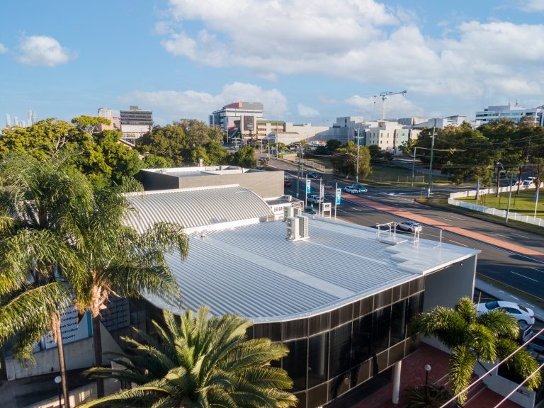 A new metal roof on a commercial building adding street appeal