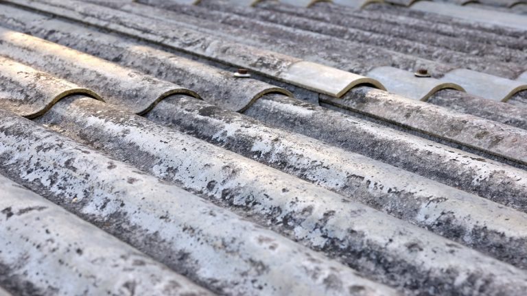 Old asbestos roofing in need of repair or removal