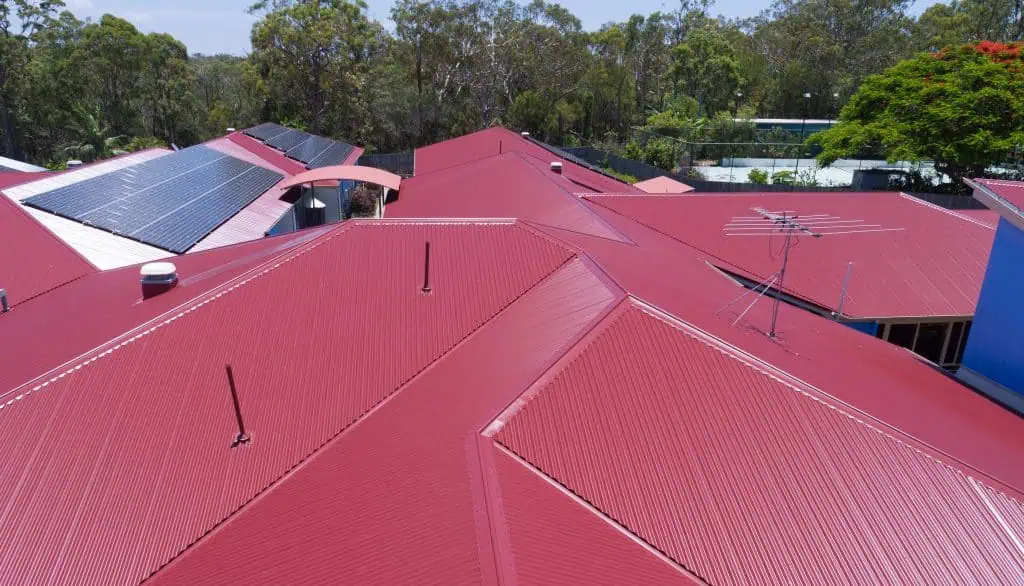 after tile conversion to red colorbond metal roof with solar panels