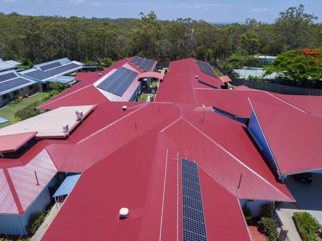 after tile conversion to red colorbond metal roof with solar panels