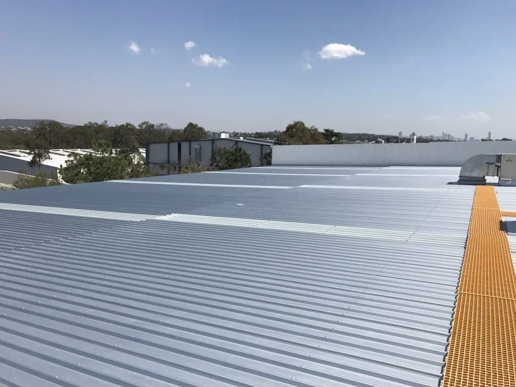 Commercial metal roof with yellow grate