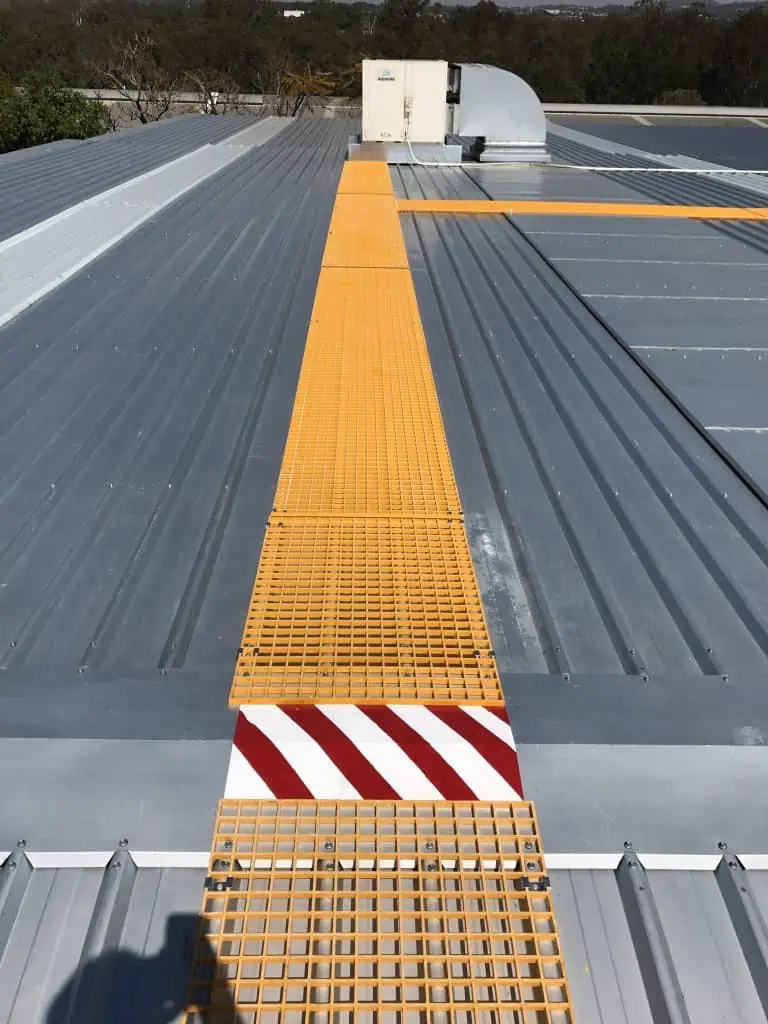 Commercial metal roof with yellow grate