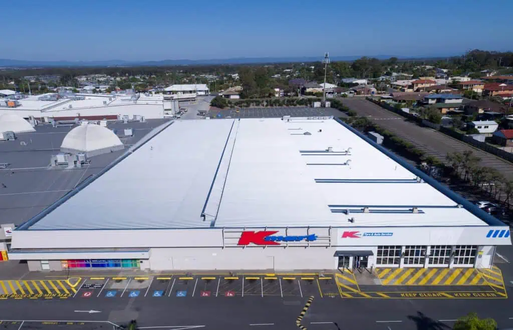 A finished metal roof replacement on a K-Mart Roof