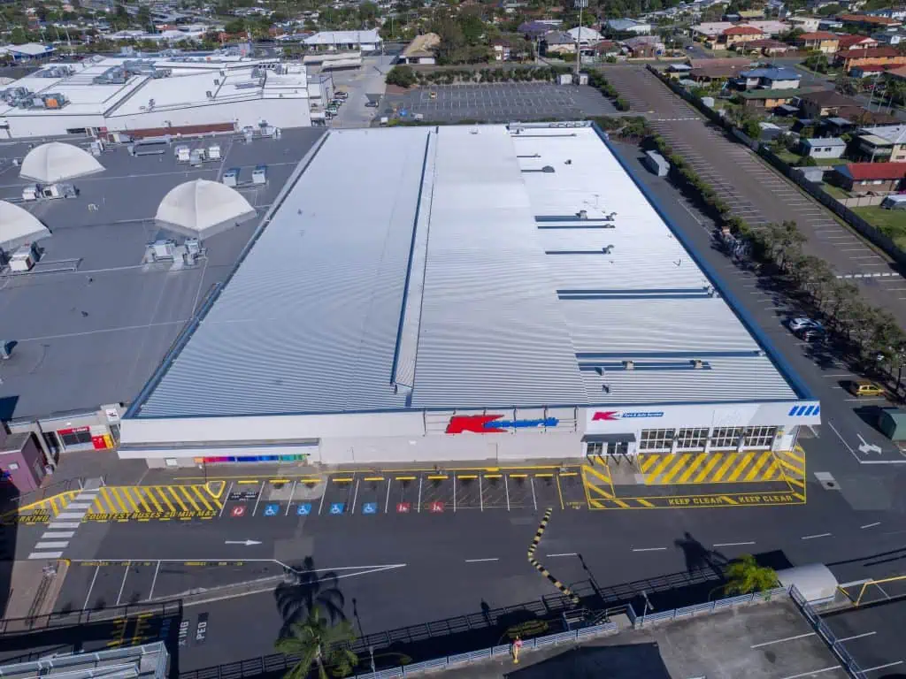 A finished metal roof replacement on a K-Mart Roof