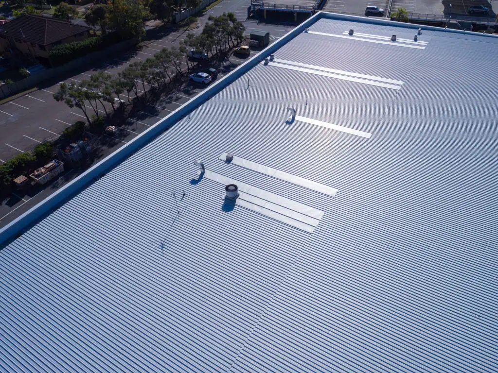 A finished metal roof replacement on a K-Mart Roof