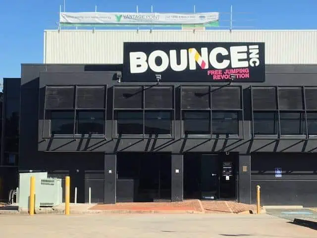 Bounce Inc building with a new metal roof installed by Vantage Point Roofing